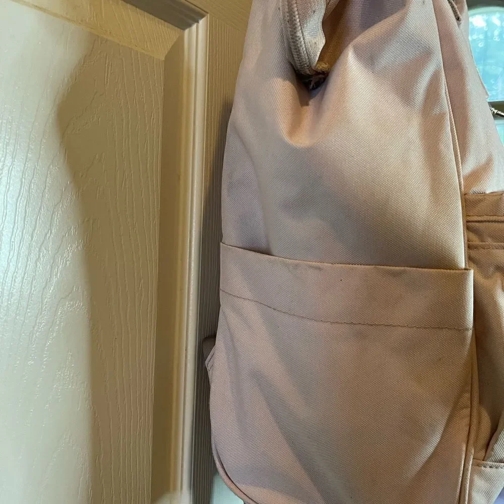 Swiss Gear light pink canvas multi purpose backpack with Rose gold Hardw…